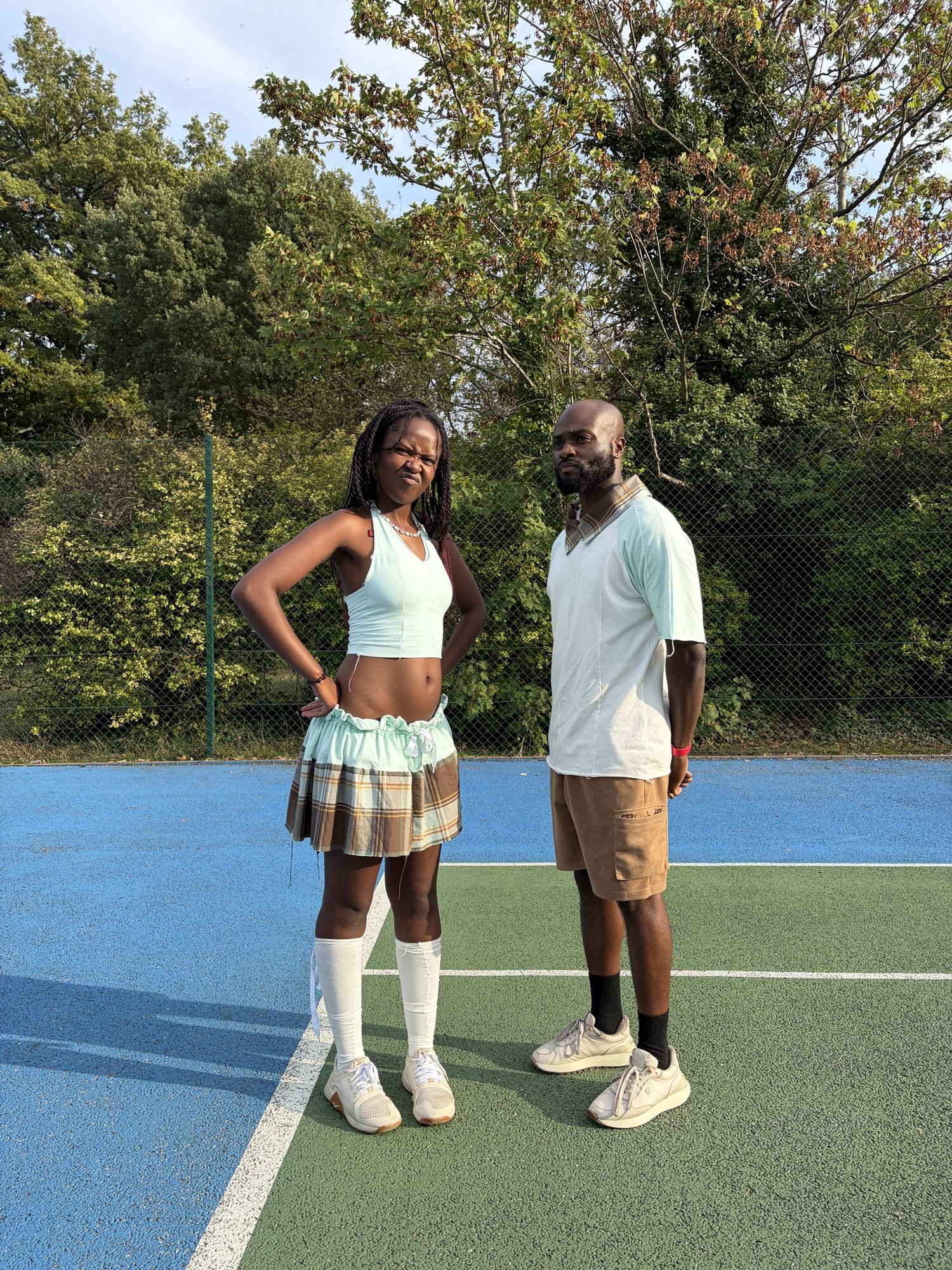 obi and Kah'Nya standing together on court